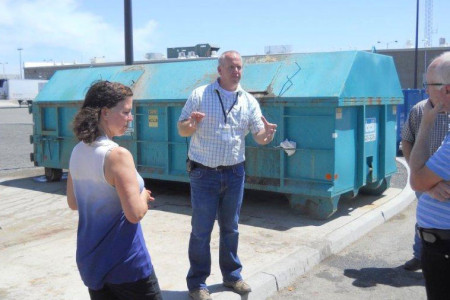 "Sustainability guru" for CRCC, Sam Harris, talks with Linda Glasier from WA Dept. of Ecology and JBLM's Solid Waste & Recycling Program Manager Ron Norton. 