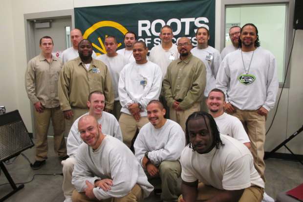 CRCC's most recent Roots graduates: Kuoy Chhong, Christopher Edwards, Edwin Edwards, Seth Fulmer, Richard Johnson, James Lees, Neil Mitchell, Andrew Quinn, Jayson Smith, Travis Turley, Kimothy Wynn, and Jeffery Willis. These inmates successfully completed the Roots of Success Environmental Literacy Curriculum where they learned about a variety of environmental issues and prepared for re-entry into the green economy. Photo by Joslyn Rose Trivett