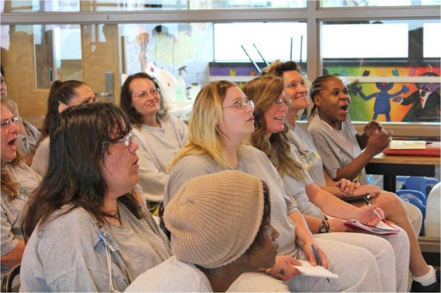 Students in SPP's Science and Sustainability Lecture series react to the guest birds of prey. Photo by Tiffany Webb.