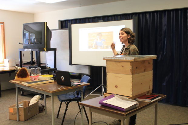 Bee Thinking's Rebekah Golden teaches a class of staff and incarcerated students about beekeeping. Photo by Emily Passarelli.