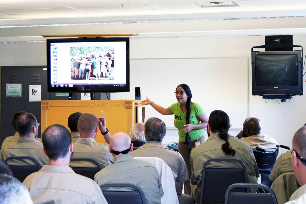 Zarna Joshi of Women of Color Speak Out presents at Stafford Creek Corrections Center. We bring the transformative power of education and restoration inside the prison fence, and learn how to be better citizens of human and ecological communities. Photo by Tiffany Webb.