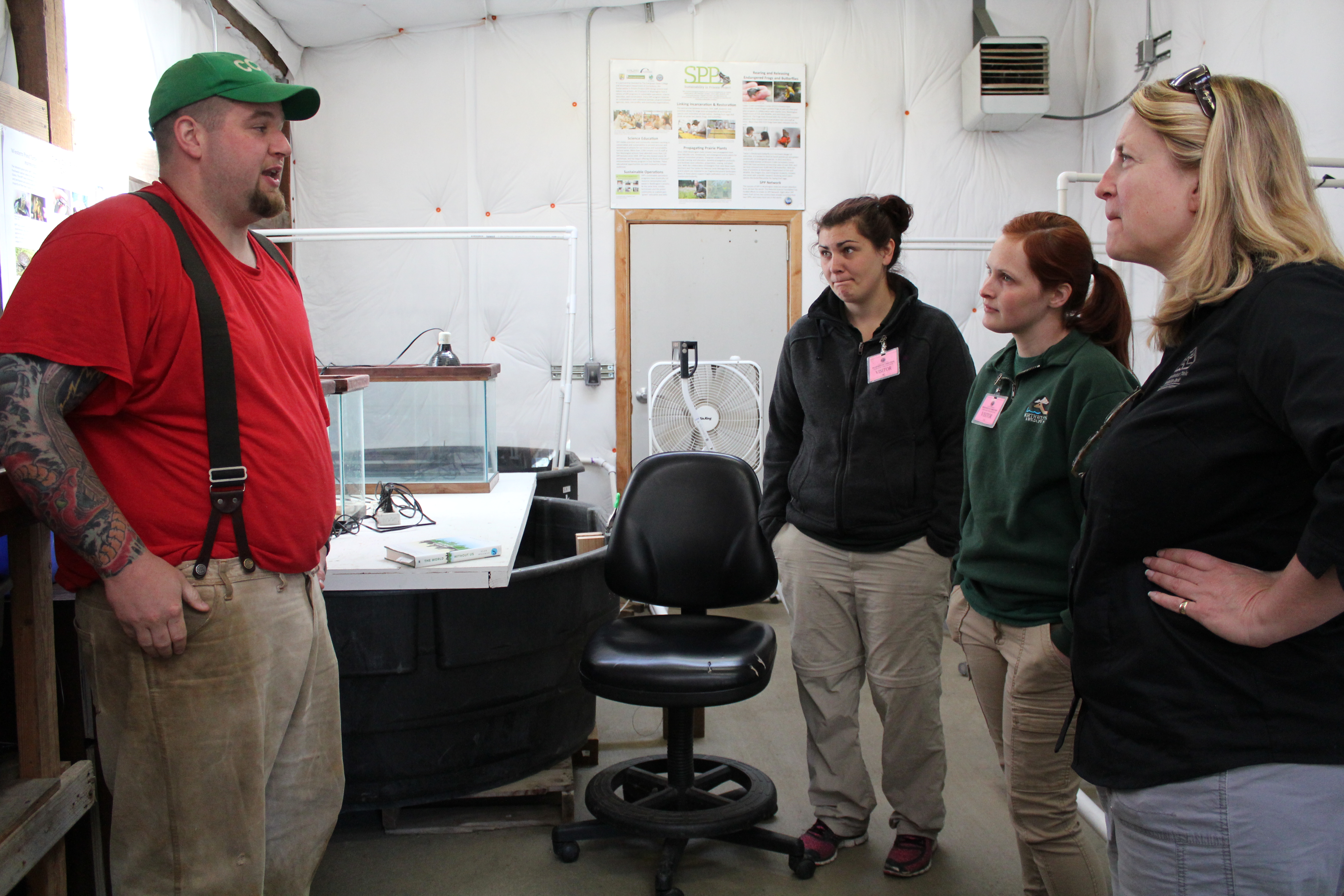 Mr. Boysen giving a tour to zookeepers and veterinarian from Northwest Trek Wildlife Park